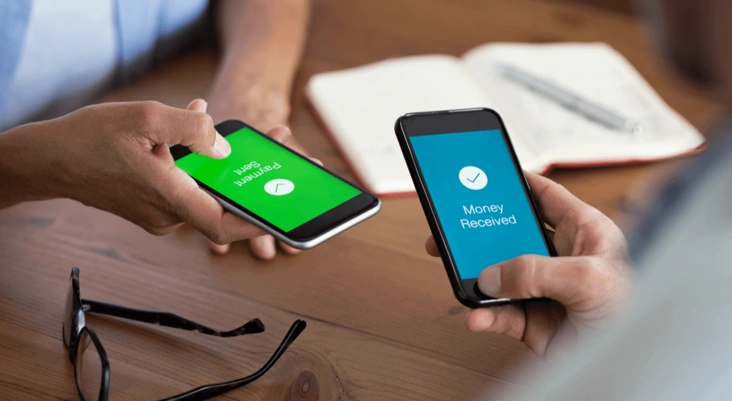 Two People Transfer Money Online