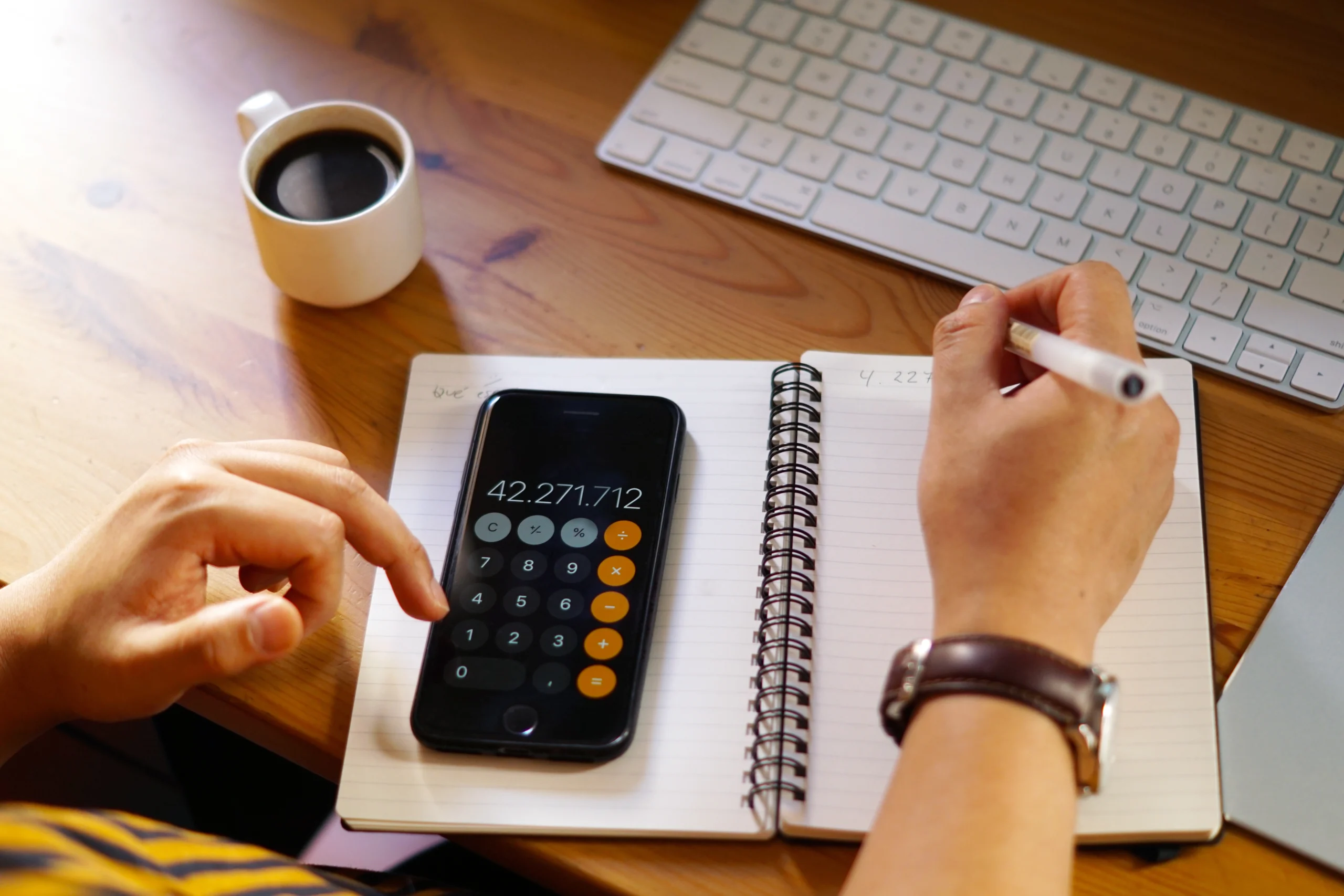 Calculator with money and financial documents showing capital requirements and budget planning for CFD trading beginners