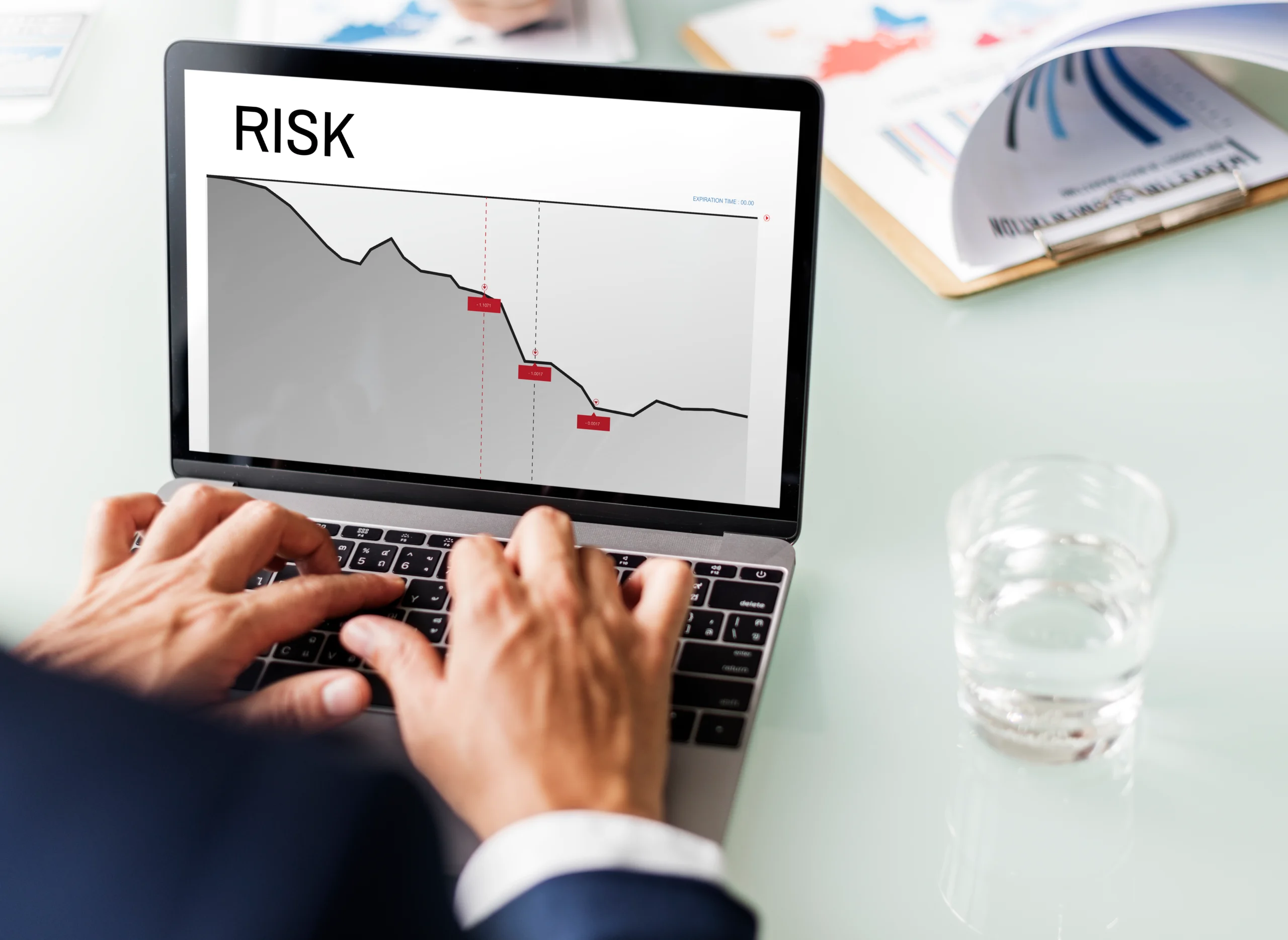 Risk management concept with stop-loss orders and position sizing calculations displayed on trading platform interface