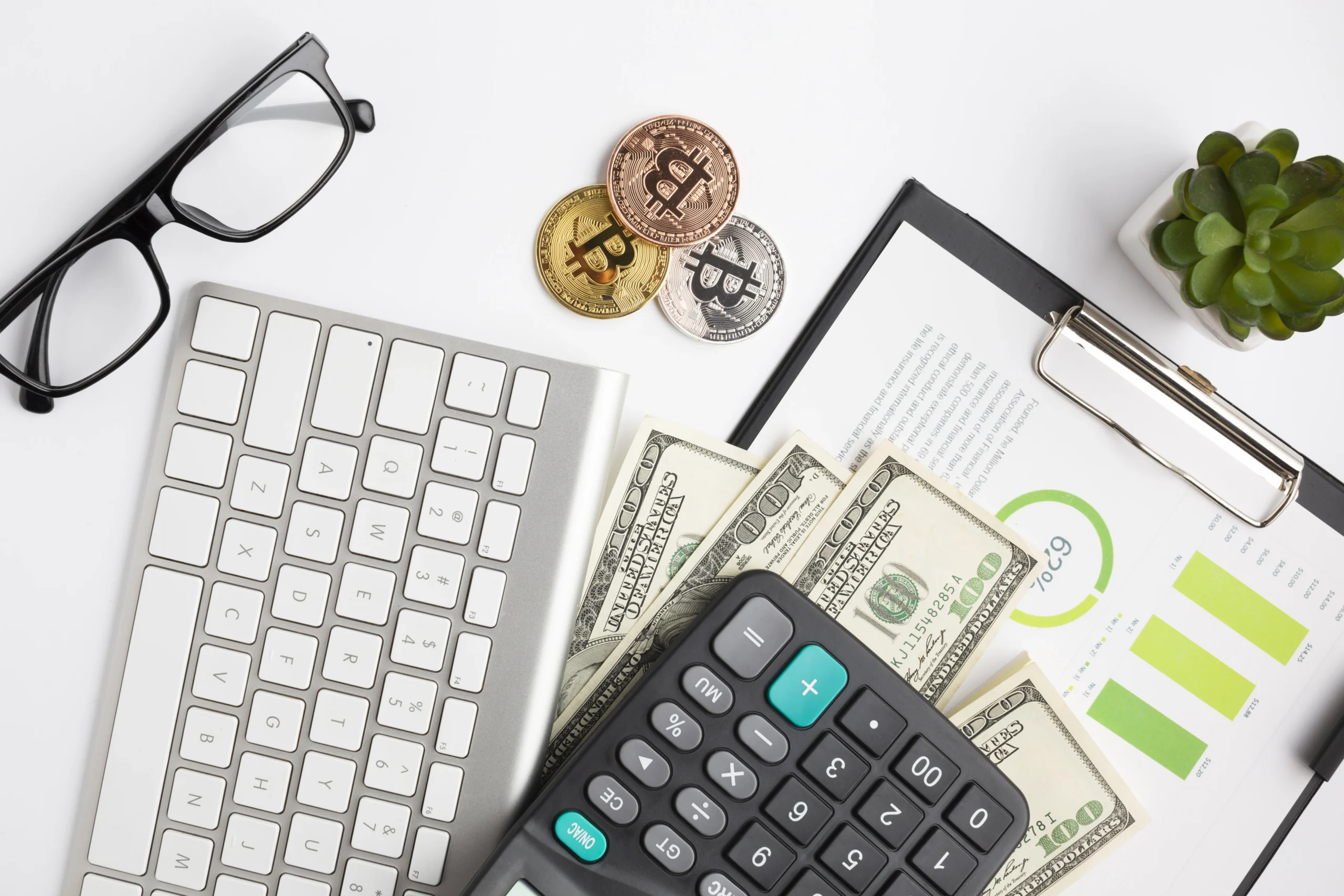 Calculator and cash stacks representing different capital requirements for trading strategies and risk management
